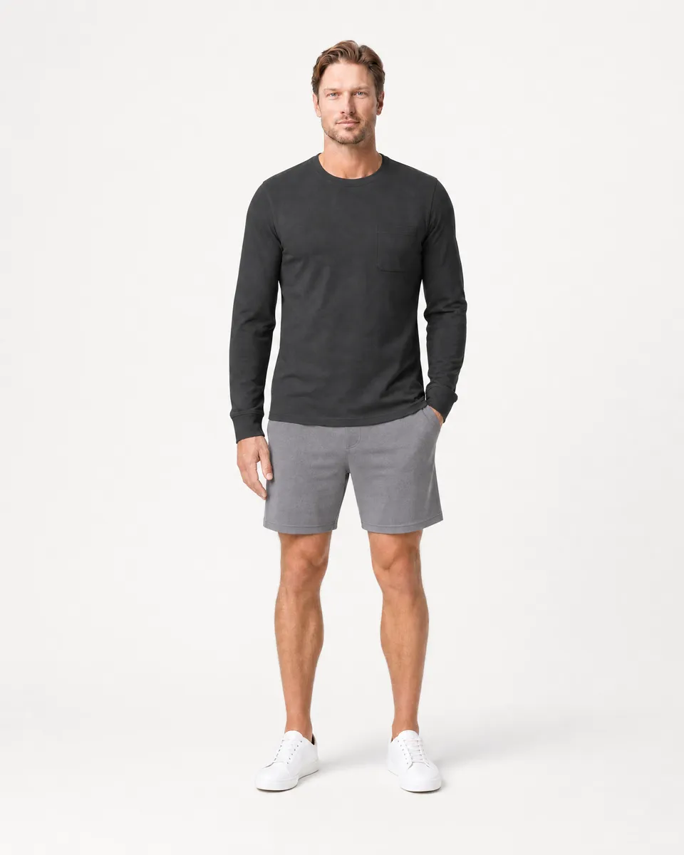 StringKing Men's Pima Jersey Long Sleeve Pocket Tee - Sharp Fit, Black, Full Front - Human Model