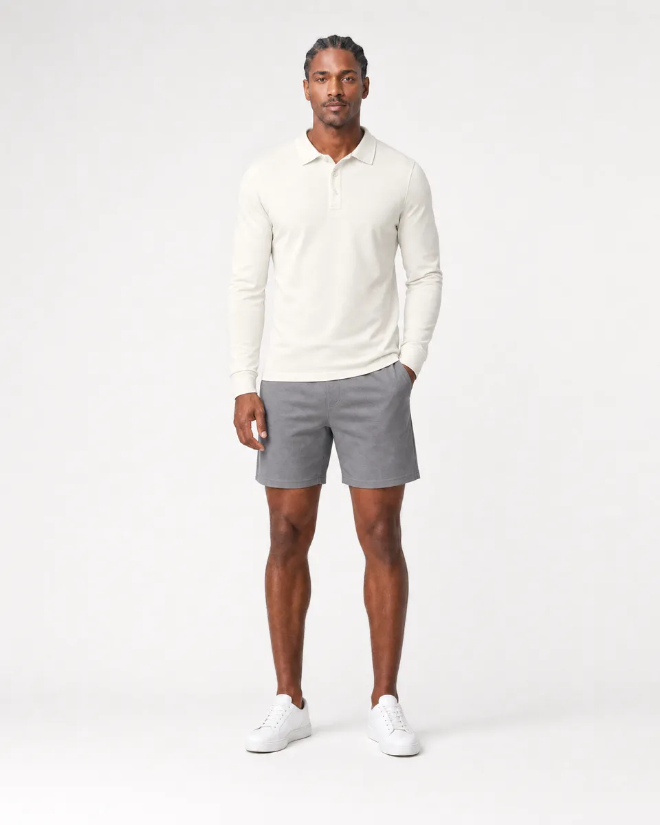 StringKing Men's Pima Jersey Long Sleeve Polo - Sharp Fit, Tofu, Full Front - Human Model