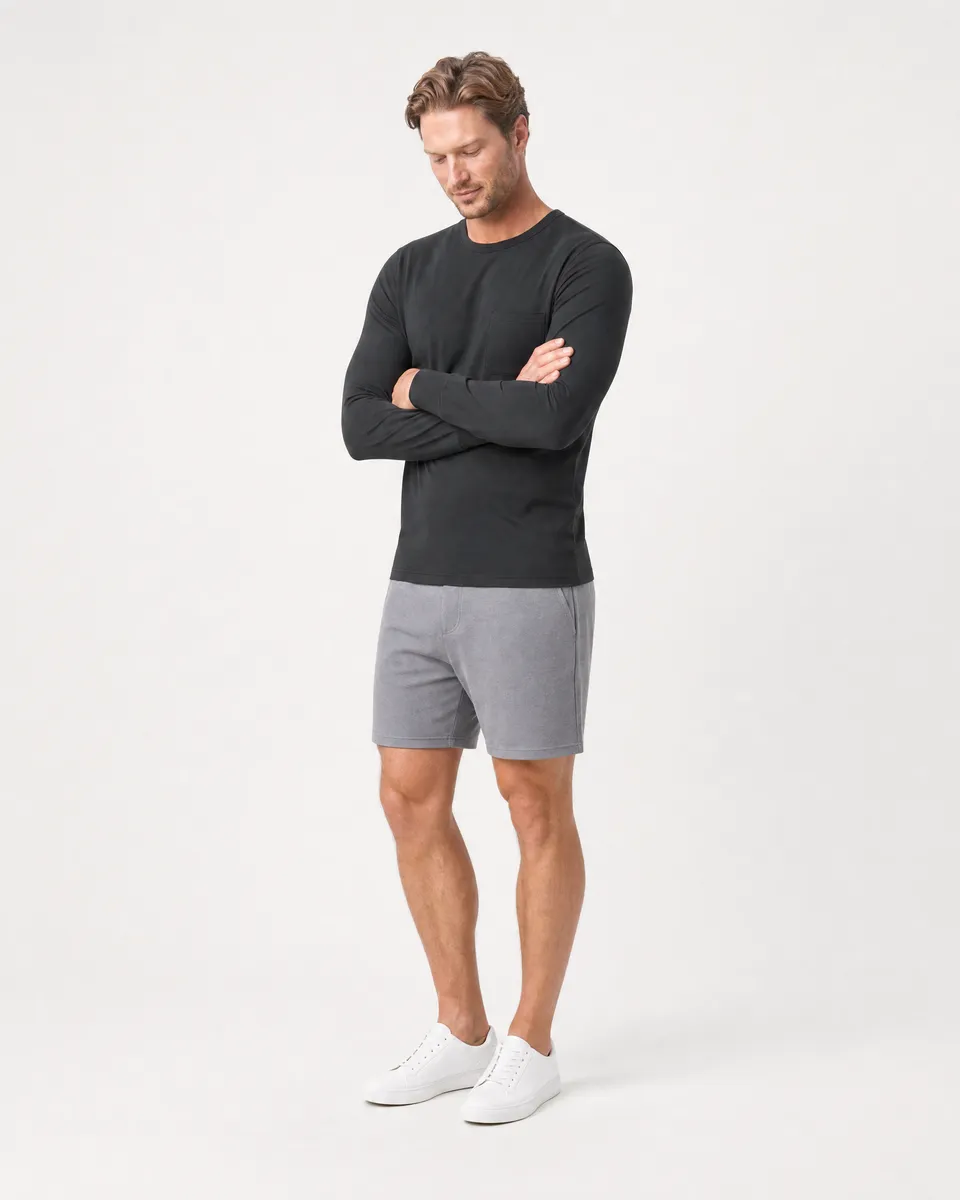 StringKing Men's Pima Jersey Long Sleeve Pocket Tee - Sharp Fit, Black, Full Front Angle - Human Model