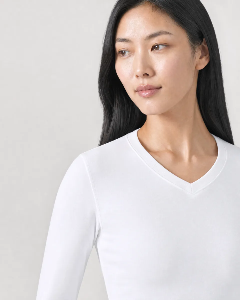 StringKing Women's Pima Terry Long Sleeve V-Neck Tee - Sharp Fit, White, Collar Shoulder - Human Model