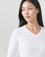 StringKing Women's Pima Terry Long Sleeve V-Neck Tee - Sharp Fit, White, Collar Shoulder - Human Model