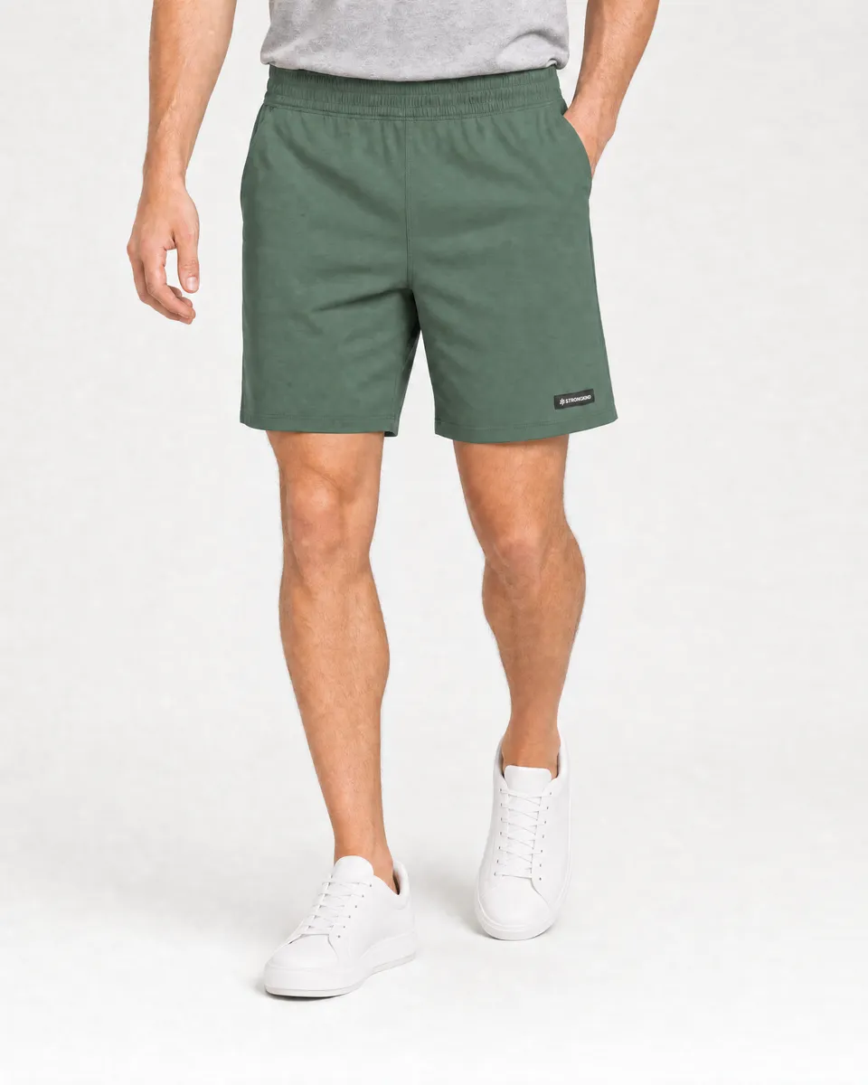 StringKing Men's Nylon Flex Game Shorts - Relaxed Fit, Green, Full Front - Human Model - Waist to Mid-calf