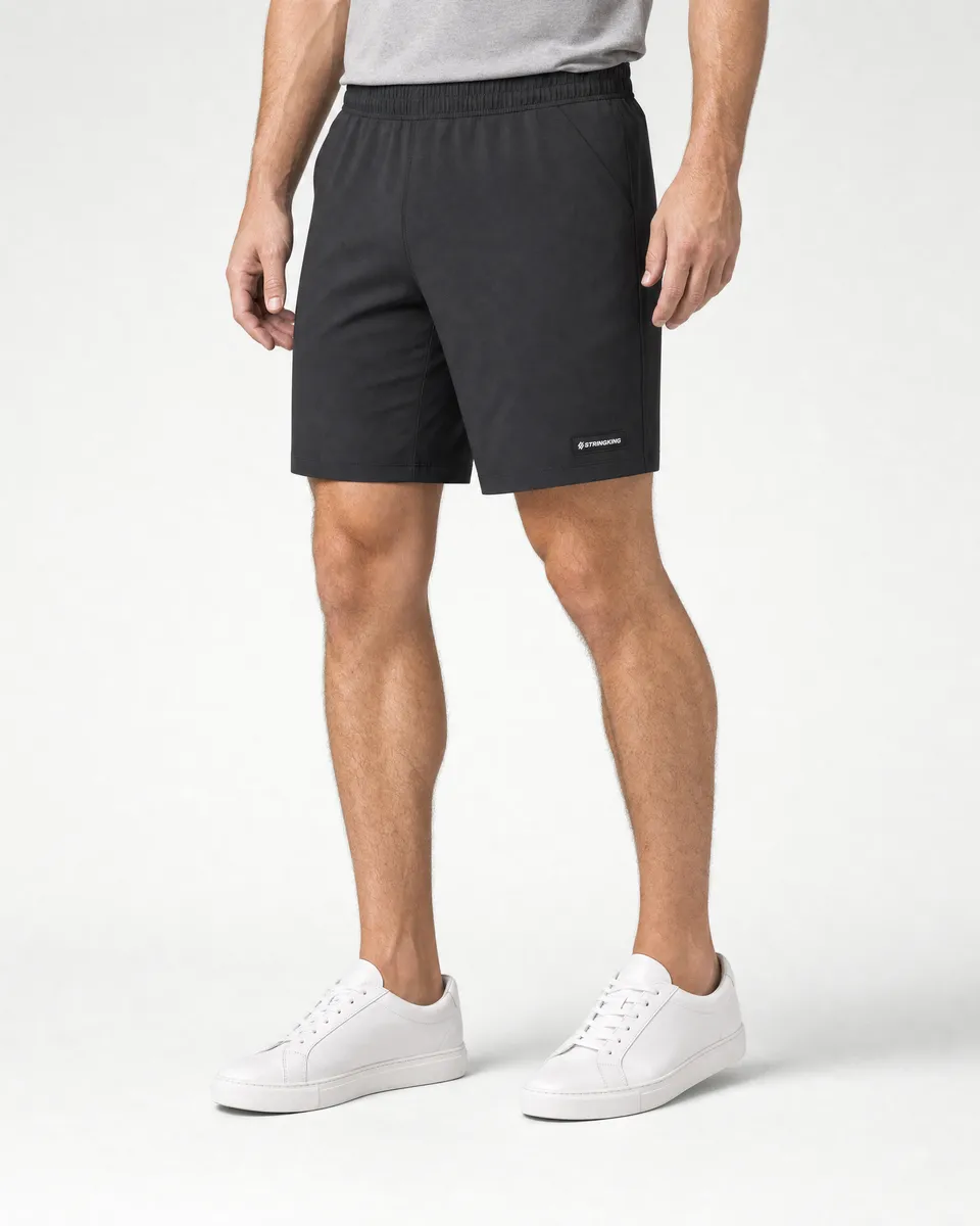 StringKing Men's Nylon Flex Game Shorts - Sharp Fit, Black, Full Front - Human Model - Waist to Mid-calf