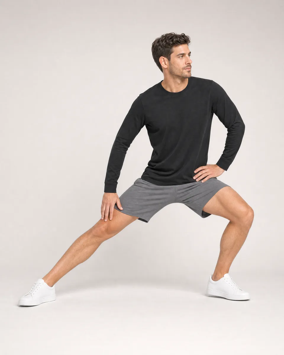 StringKing Men's Pima Jersey Long Sleeve Tee - Sharp Fit, Black, Full Front Angle - Human Model