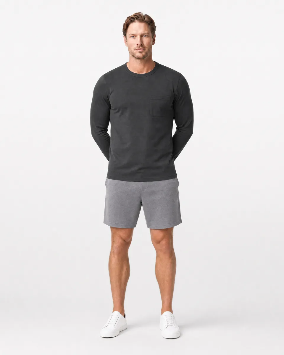 StringKing Men's Pima Jersey Long Sleeve Pocket Tee - Sharp Fit, Black, Full Front - Human Model - Top of head to Knees