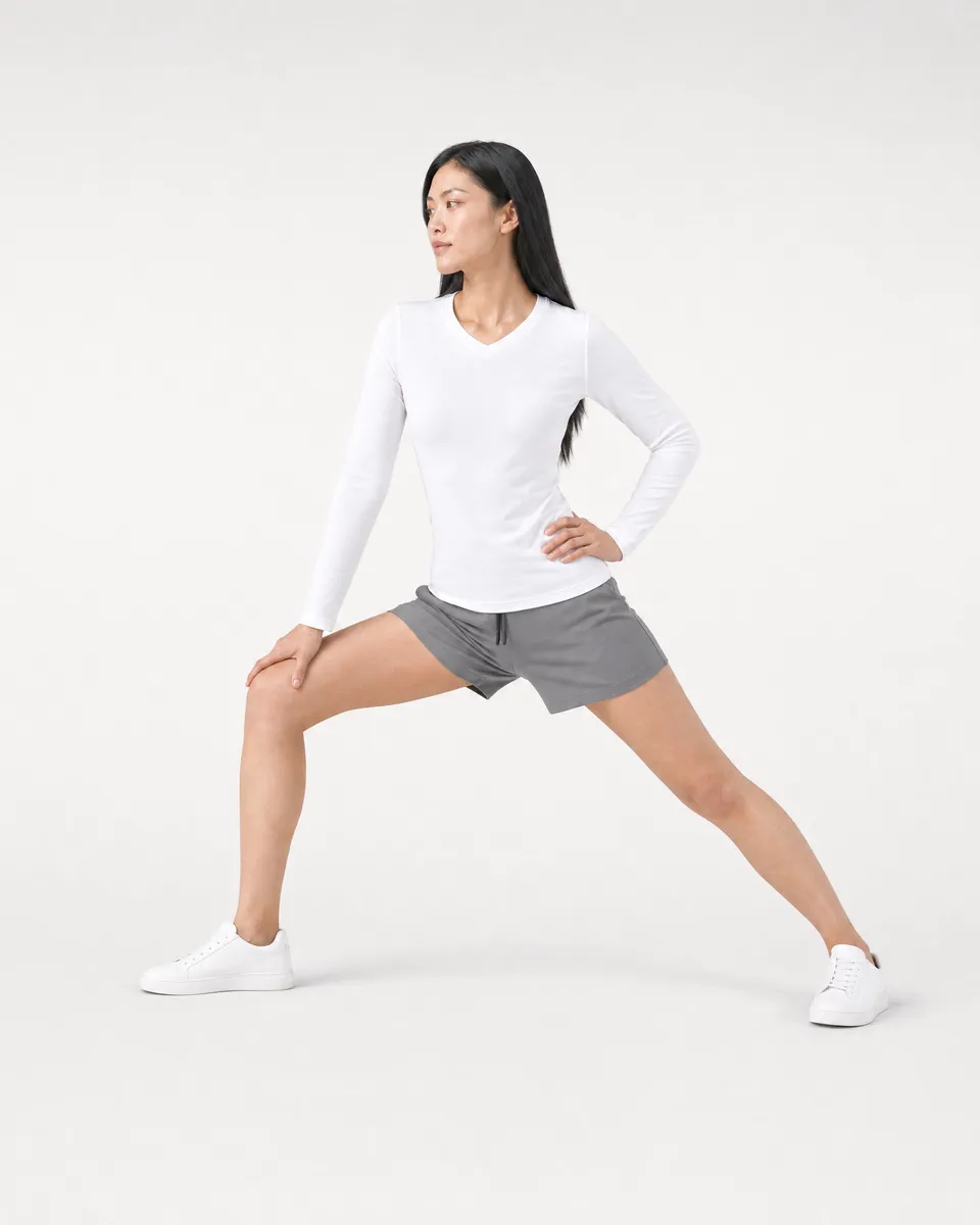StringKing Women's Pima Terry Long Sleeve V-Neck Tee - Sharp Fit, White, Full Front Angle - Human Model