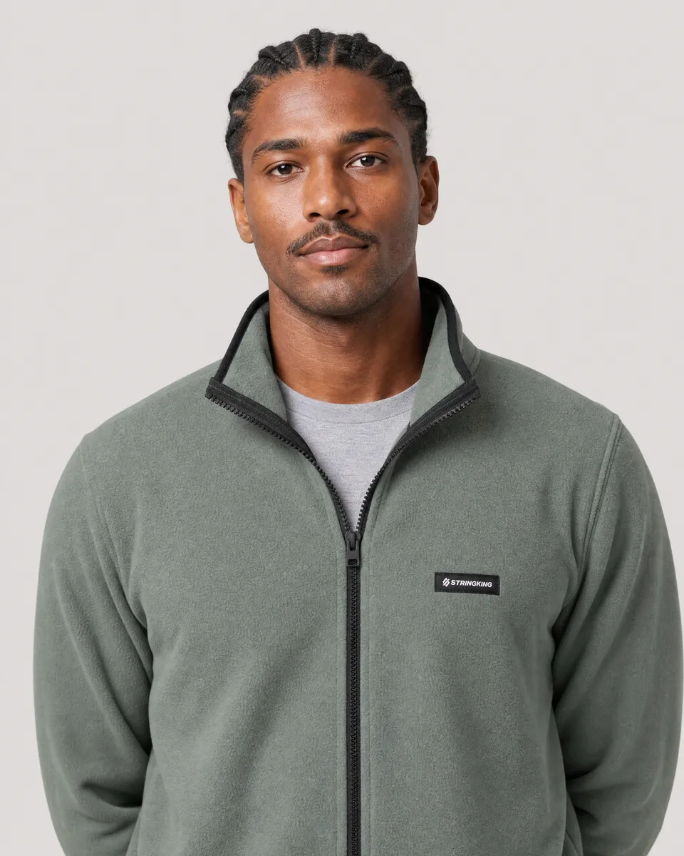 StringKing Men's Polartec Fleece Full Zip with Pockets - Sharp Fit, Avenue Green, Collar Shoulder - Human Model